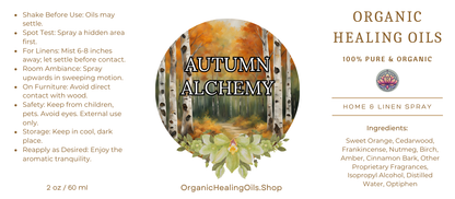 Label for Autumn Alchemy Home & Linen Spray by Organic Healing Oils. The label features a birch forest with autumn leaves in the background and instructions for use on the left. The product is described as 100% pure and organic, highlighting key ingredients like sweet orange, cedarwood, frankincense, nutmeg, birch, amber, cinnamon bark, other proprietary fragrances, and witch hazel. The label also includes safety and storage instructions and the website OrganicHealingOils.Shop.