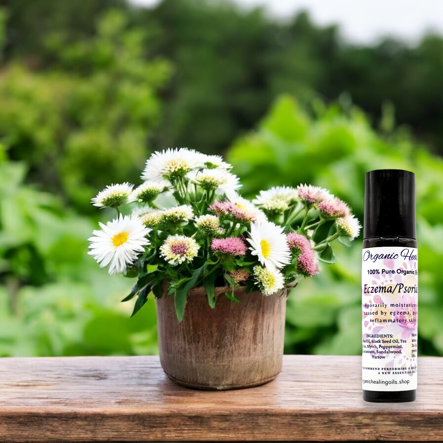 Eczema and Psoriasis Soothing Oil Rollers displayed on a wooden table amidst Yarrow flowers, highlighting the natural ingredients for skin soothing.