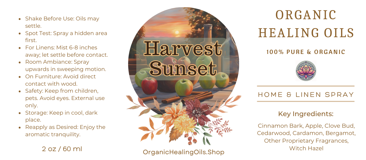 Harvest Sunset Spray "Label for Harvest Sunset Home & Linen Spray by Organic Healing Oils. The label features an autumn scene with apples and cinnamon sticks on a table at sunset. Instructions for use are on the left. The product is described as 100% pure and organic, highlighting key ingredients like cinnamon bark, apple, clove bud, cedarwood, cardamom, bergamot, other proprietary fragrances, and witch hazel."