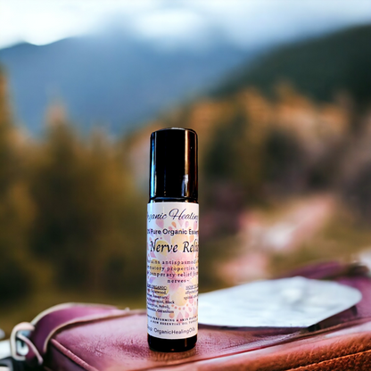 Organic Healing Oil's Nerve Calming Oil 10ml Roller bottle placed on a weathered leather handbag