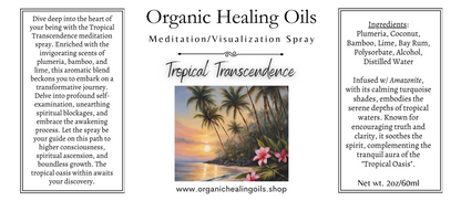 Label featuring a tropical beach scene at sunset with palm trees and pink frangipani flowers, accompanied by a bottle of 'Tropical Transcendence' Meditation Spray and visualization spray from Organic Healing Oils.