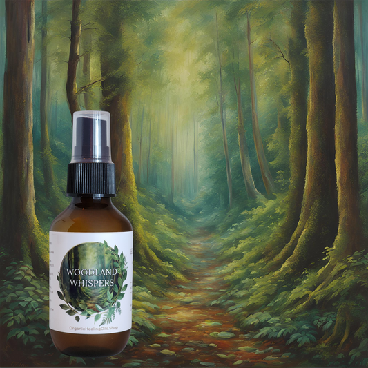 Woodland Whispers spray bottle by Organic Healing Oils, in front of a serene forest path surrounded by lush greenery. The scene conveys the calm and grounding ambiance of a woodland retreat, highlighting the natural essence of the spray.